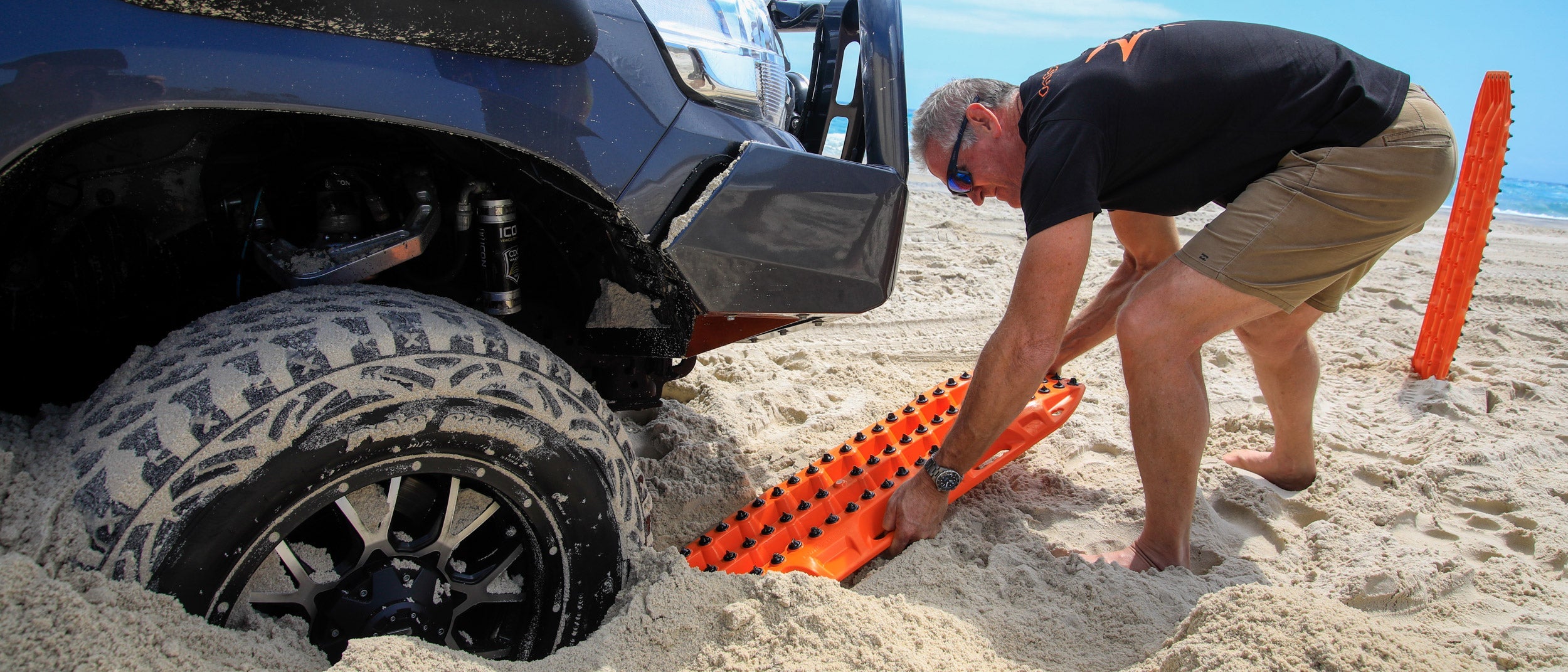 MAXTRAX recovery boards being used on beach