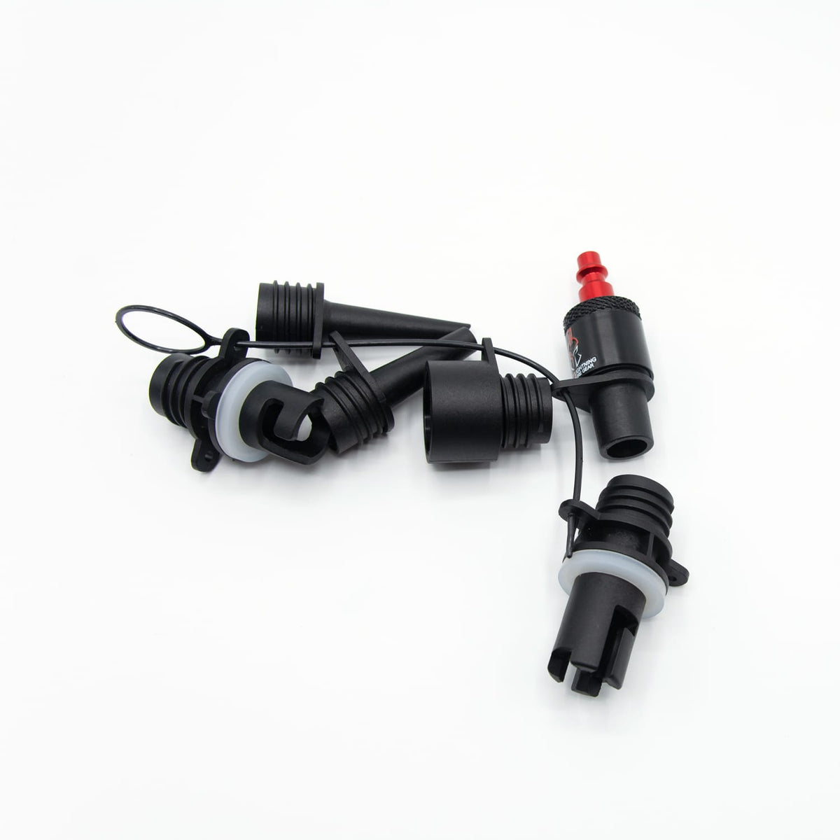 Close-up of two of the Marine Inflatable Adapter's valve attachments alongside the hose adapter