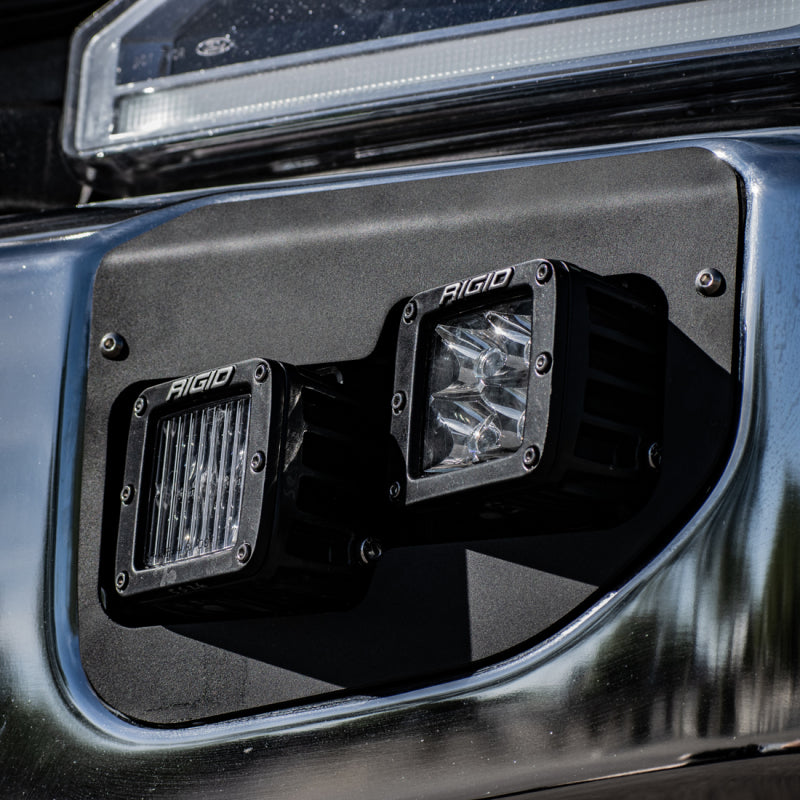 Rigid Industries D-Series fog lights illuminated on a 2020+ Ford Super Duty