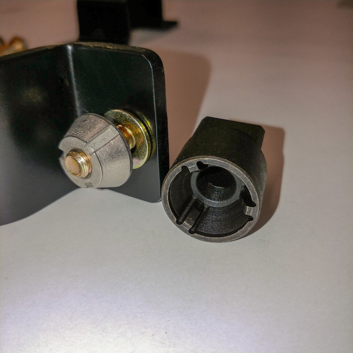 Security nut beside the special removal socket