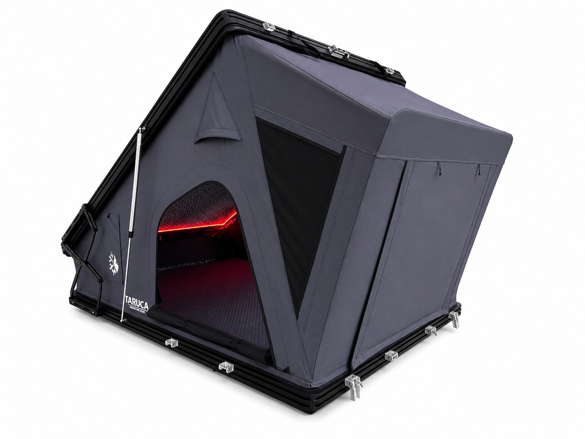 Taruca Dark Rogue rooftop tent open with red interior lighting glowing through the entry