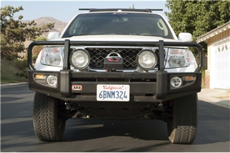 ARB Deluxe combination bull bar on a Nissan Frontier D40, front three-quarter view