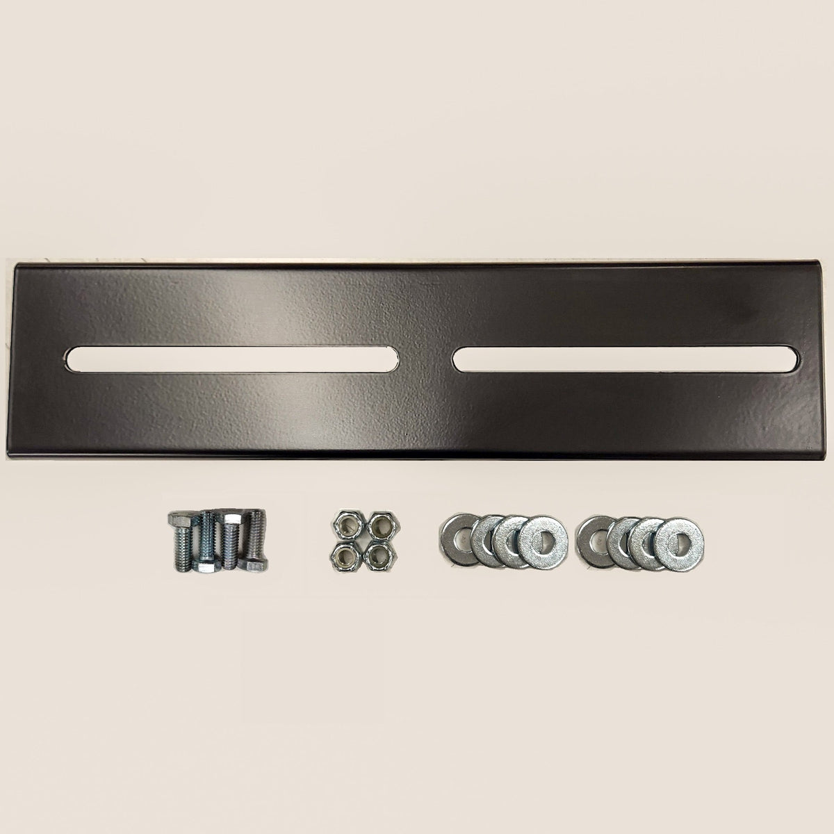 Top view of slotted winch mount plate and hardware