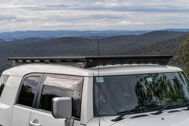 ARB BASE Rack 84″×51″ open deck on a 2007-2014 Toyota FJ Cruiser — assembled full-length platform