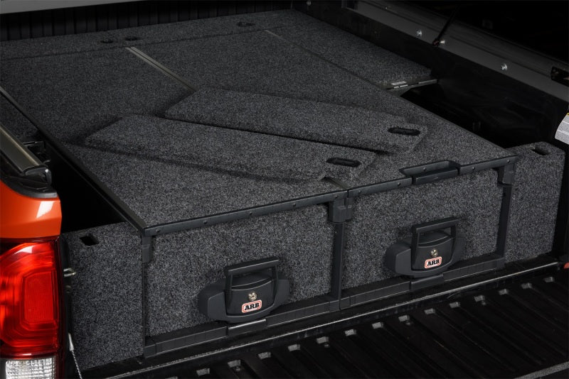 ARB Outback Solutions side floor kit installed in 3rd-gen Toyota Tacoma bed