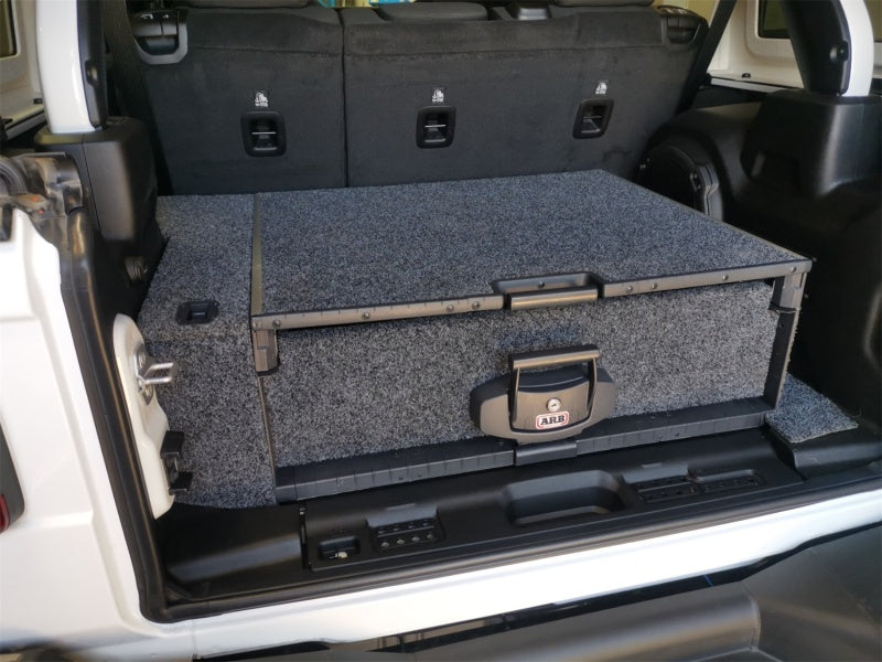 ARB sub roller drawer side floor kit installed in a Jeep Wrangler JL