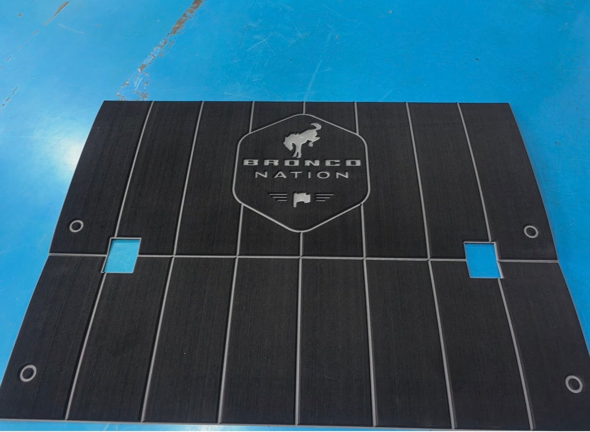 Bronco Nation logo foam pad on a blue surface