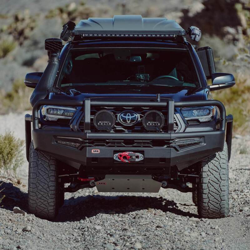 ARB Summit MKII winch bumper on a 2016–2023 Toyota Tacoma, front three-quarter view