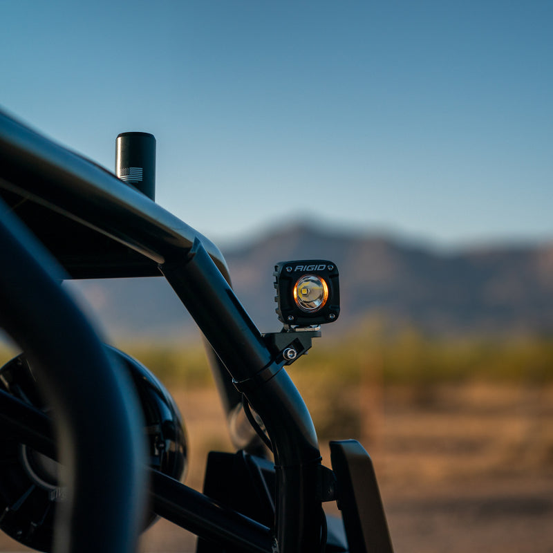Rigid Industries Revolve pod mounted to a side-by-side A-pillar tube cage