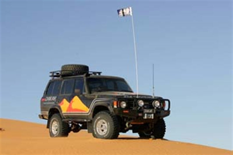 ARB Deluxe Dakar winch bumper on a Toyota Land Cruiser 60 Series — front three-quarter view