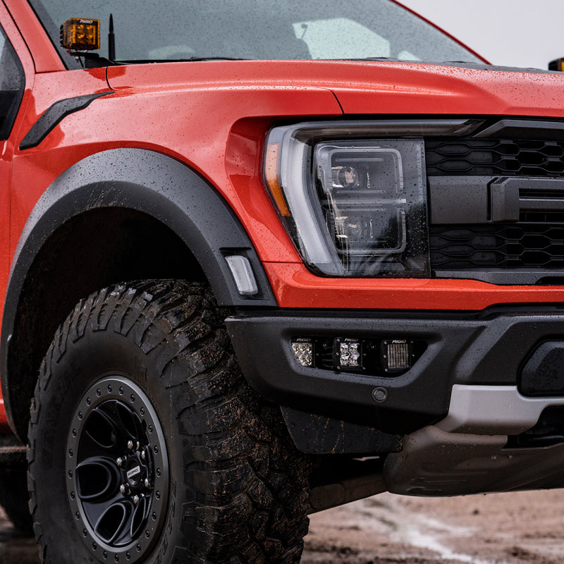 Ford Raptor low-mount D-Series fog lights illuminated at night