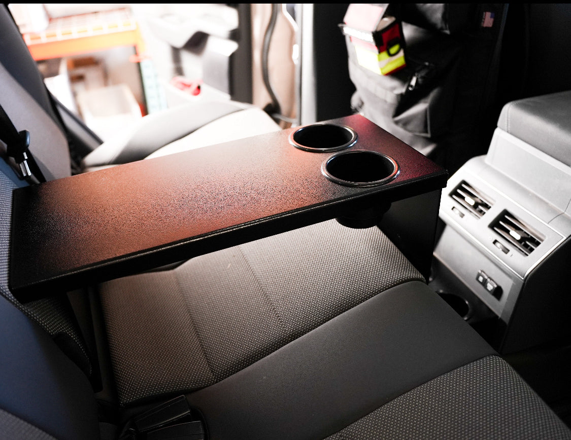 Grenadier rear seat armrest with two cupholders between the rear seats