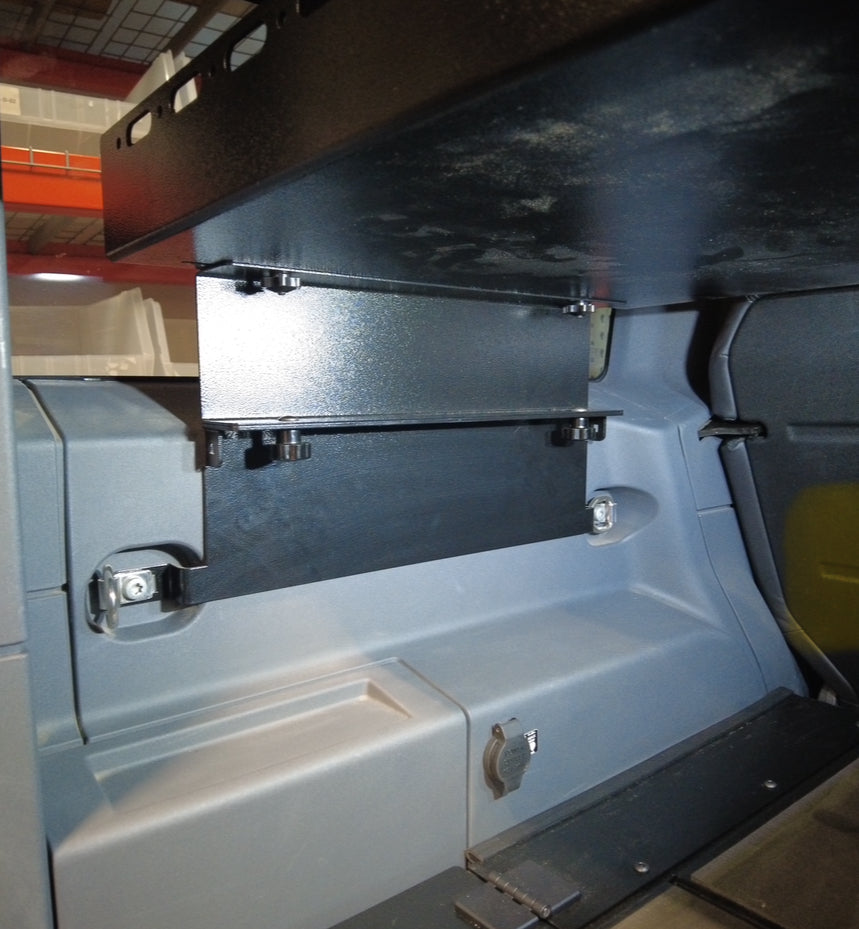 Mid Deck riser fitted between the bracket and deck inside a Grenadier