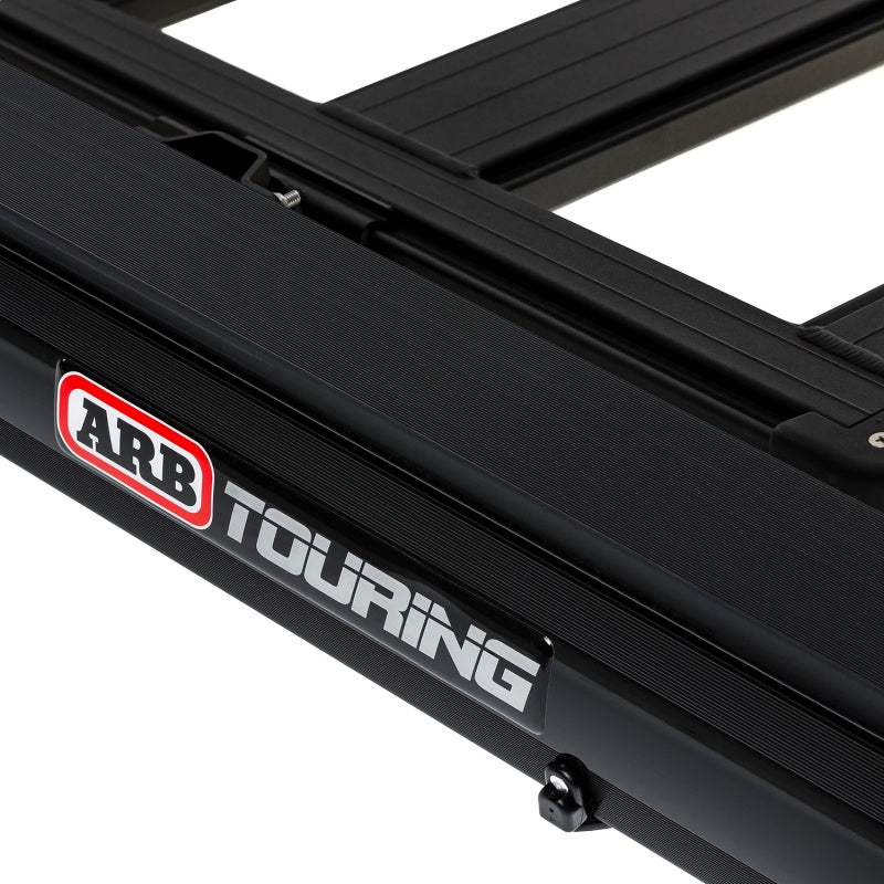ARB awning support legs set up at a campsite