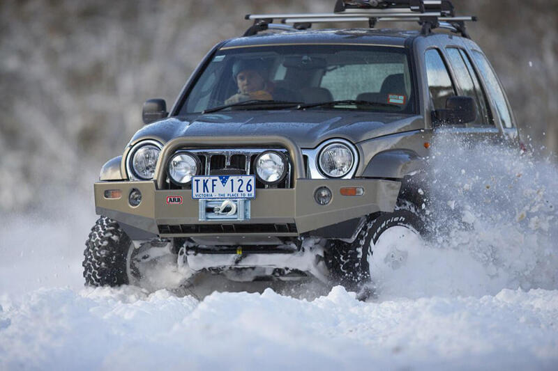 ARB Deluxe Combar winch bull bar for 2002-2005 Jeep Cherokee KJ Liberty in black powder coat