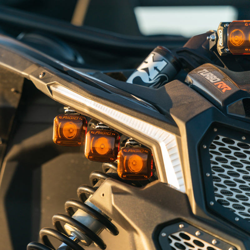 Rigid Revolve headlight kit mounted in Can-Am Maverick X3 OEM location