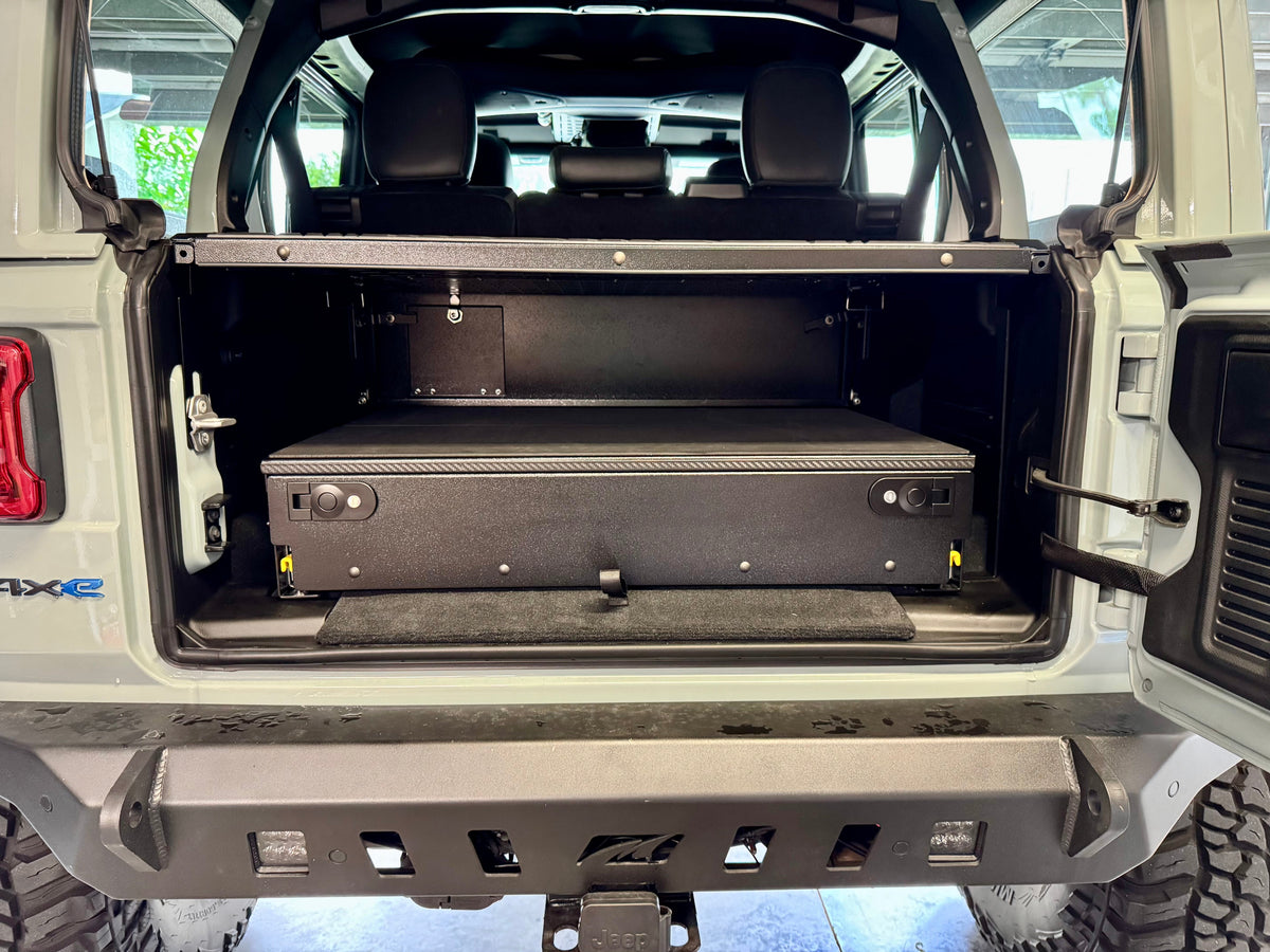 JLU complete drawer system closed under a cargo shelf in a Jeep 4xe