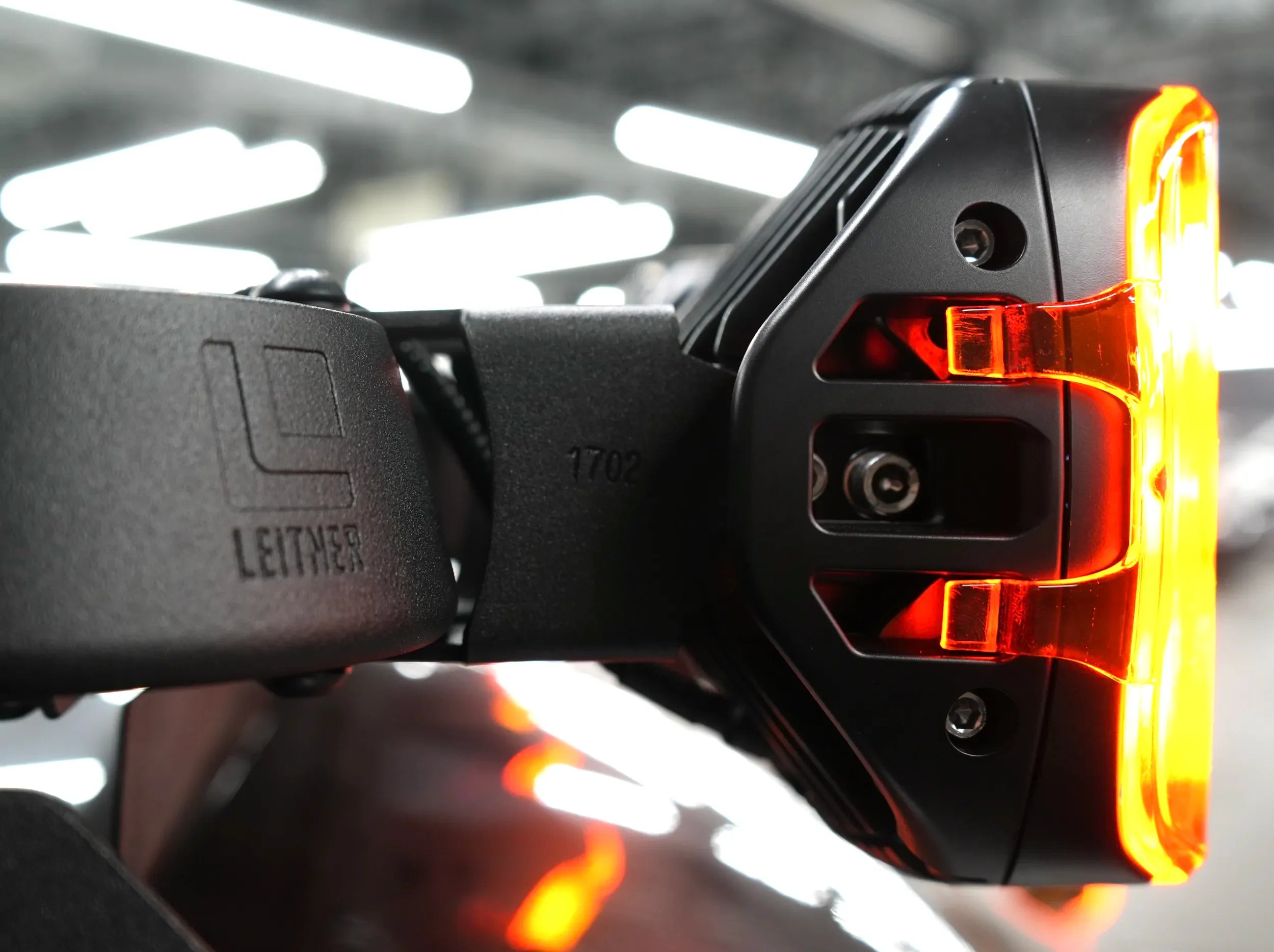 CLOSE UP SIDE VIEW OF LED LIGHT MOUNTED TO ACS ROOF RACK