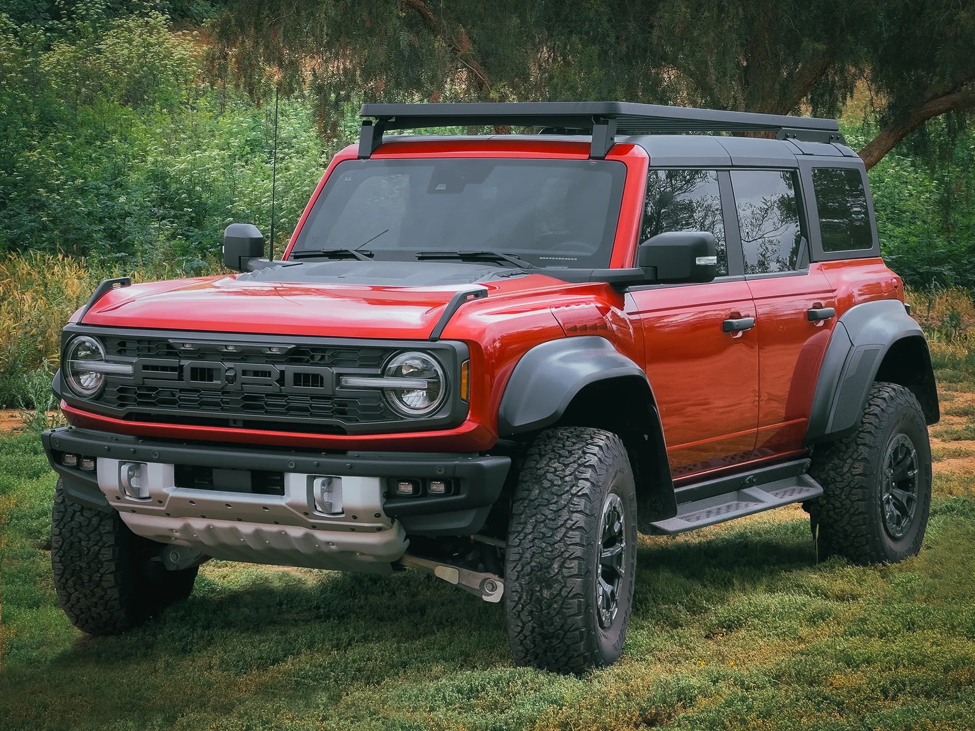 RED FORD BRONCO OUTSIDE WITH ACS ROOF RACK INSTALLED