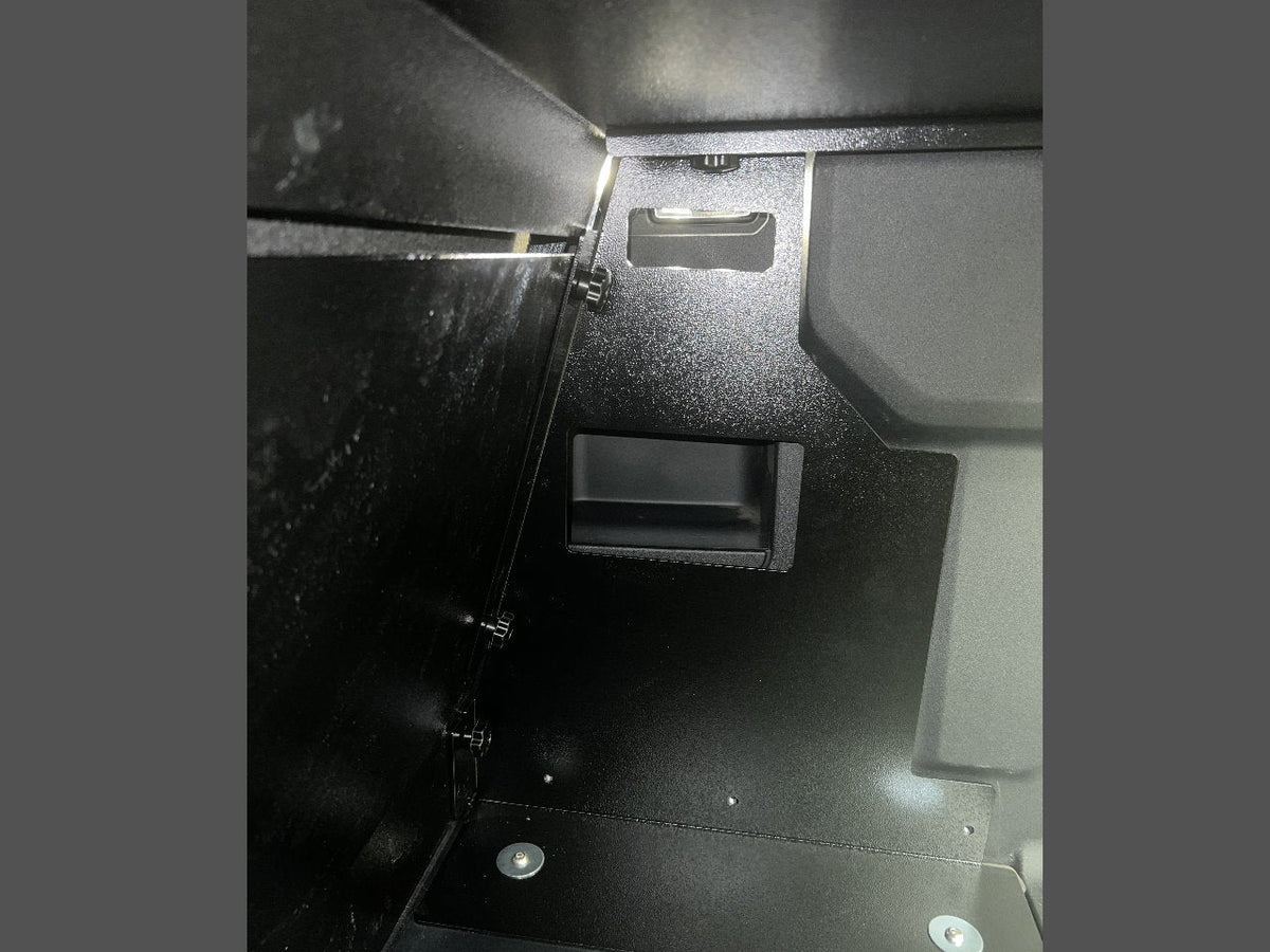Inside corner of the Bronco Locker showing the side wall and handle cutout