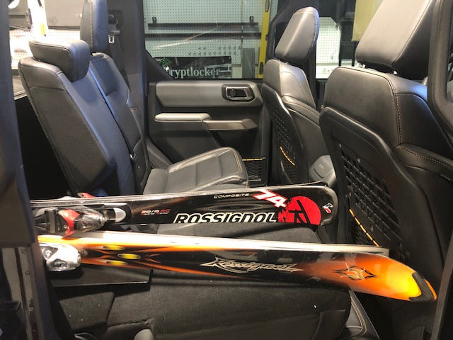 Skis passed through the Slipstream access door between the Bronco rear seats