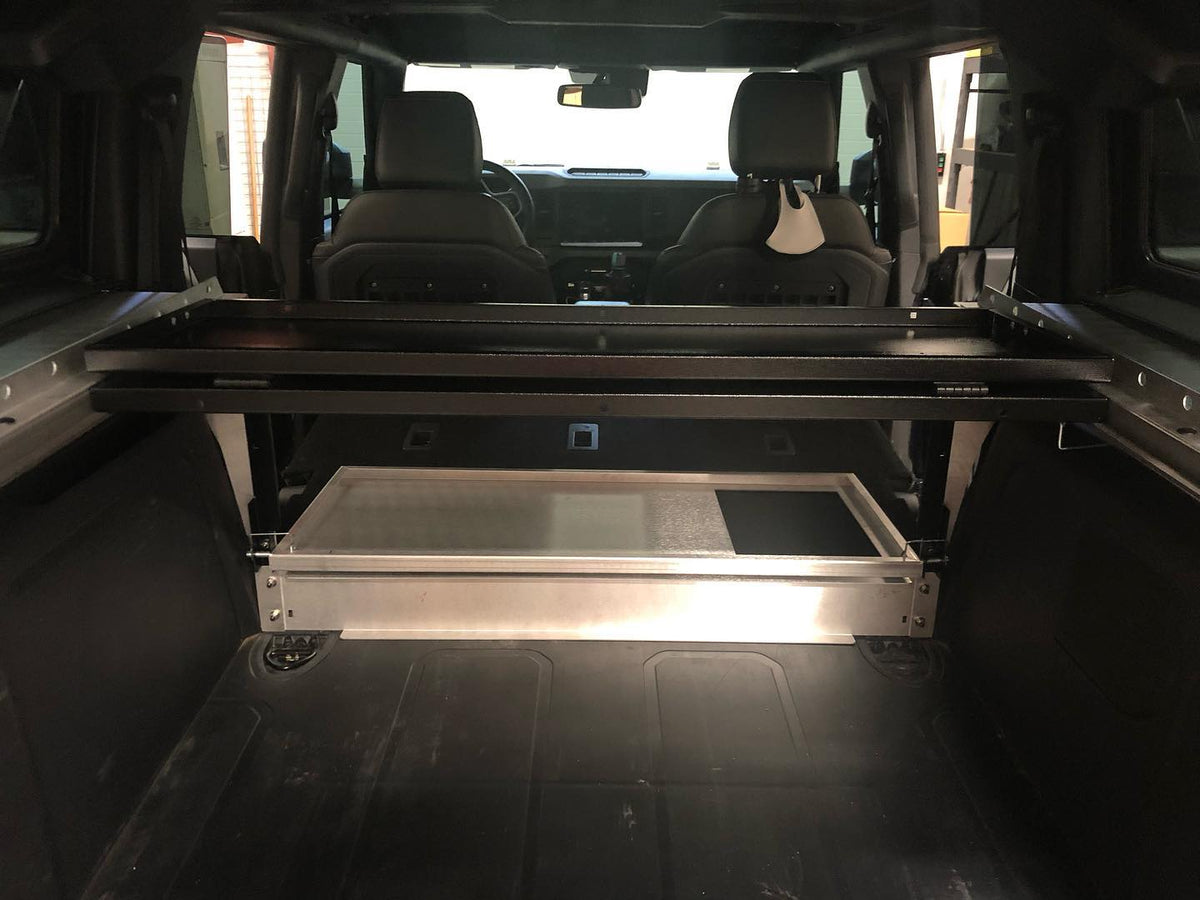 Slide tray under the Slipstream top in a Bronco cargo area