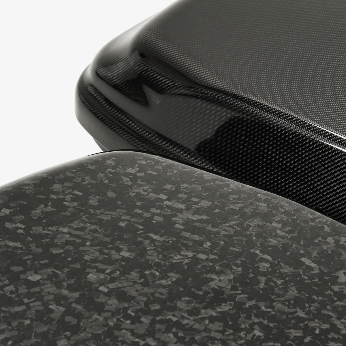 Corner detail of the cargo box showing forged and twill carbon fiber finishes