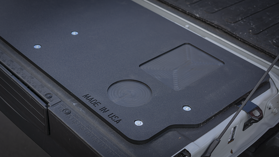 Detail of the recessed utility tray and MADE IN USA stamp on the Mountain Hatch 2023+ Super Duty panel