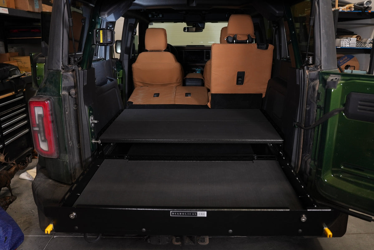 Second view of the extended Bronco drawer and deck in a green Bronco