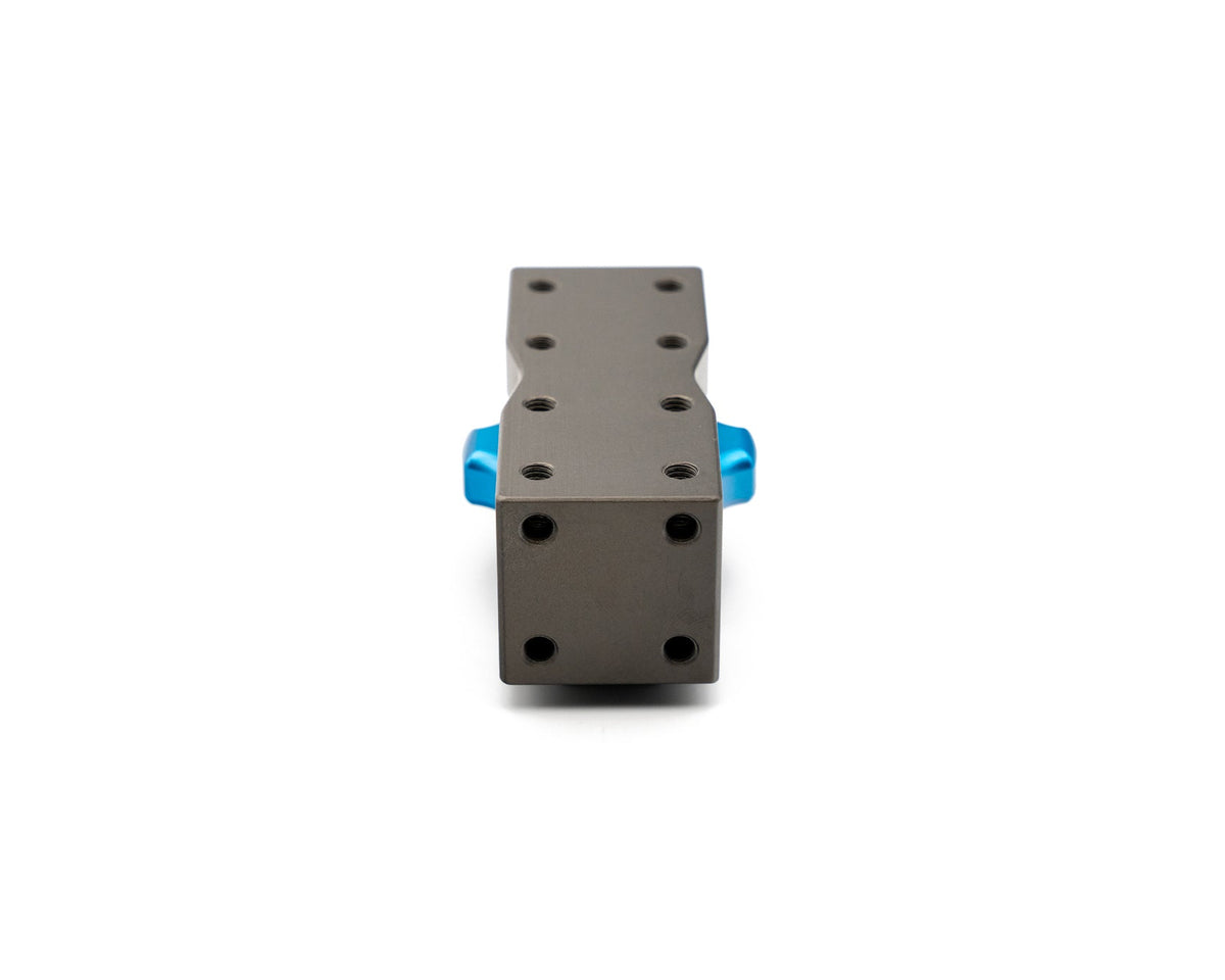 MODmount base standing on end showing threaded hole grid