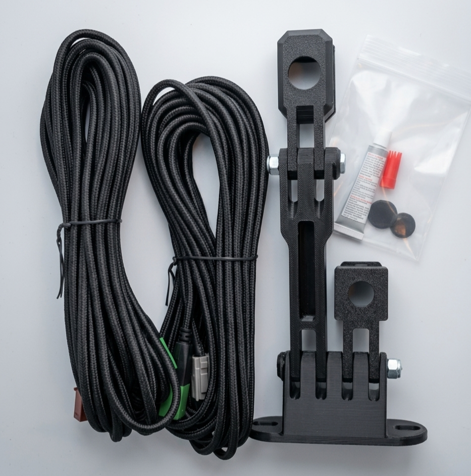 GG Offroad Tacoma 4th Gen camera relocation kit with two braided cables and pivot arm mount