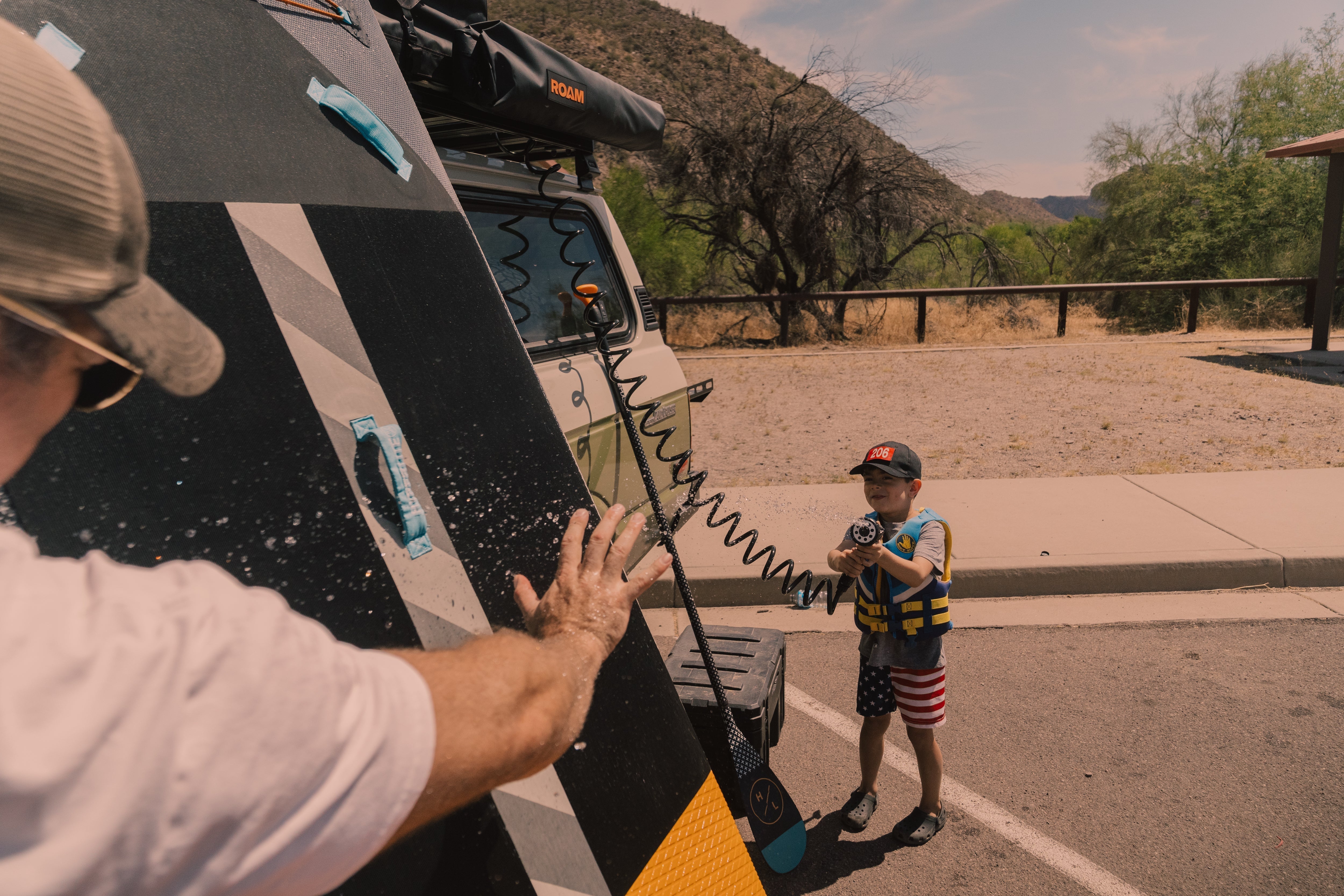 ROAM 9.5-gallon pump tank used at a campsite