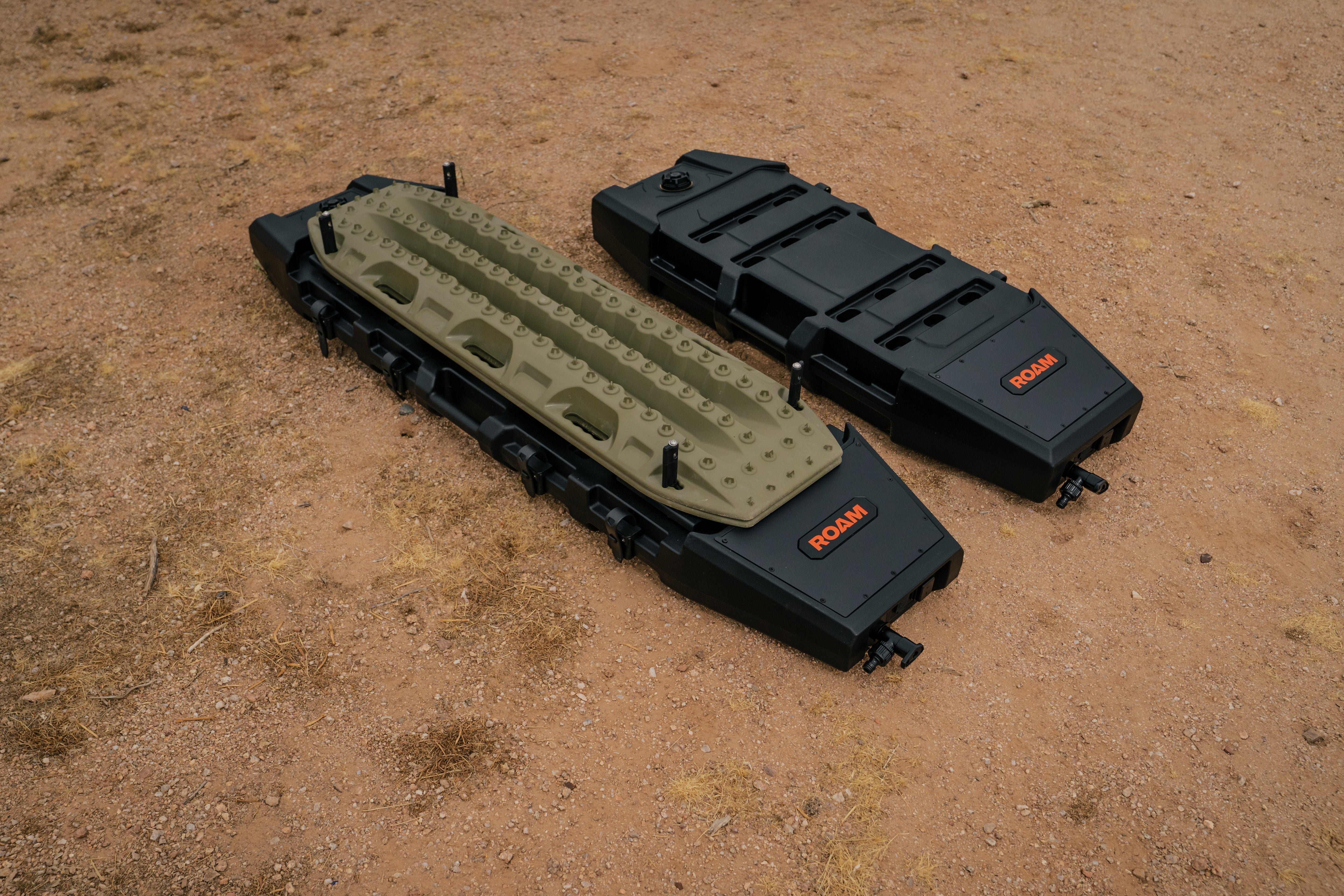 ROAM 9.5-gallon pump tank at camp with vehicle