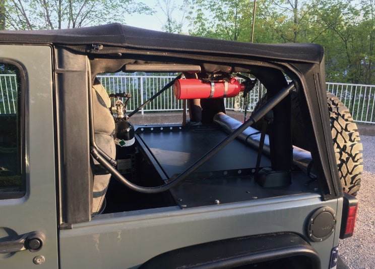 Slipstream seen through the soft top window of a gray JK, PowerTank beside it