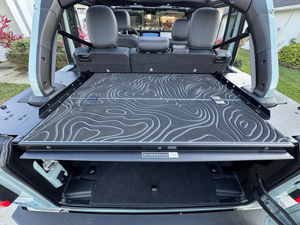 Topography foam pads on the Slipstream folding top in a white Jeep JLU