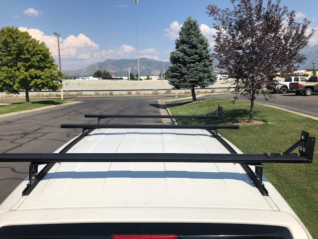 Eezi-Awn K9 load bars on a Toyota FJ Cruiser roof, top view