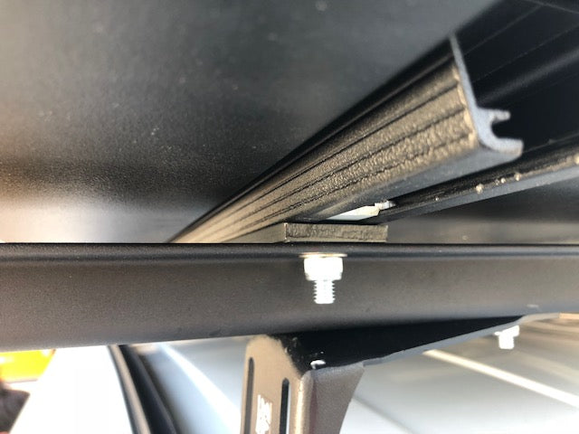 Close-up of K9 load bar T-slot and bolt