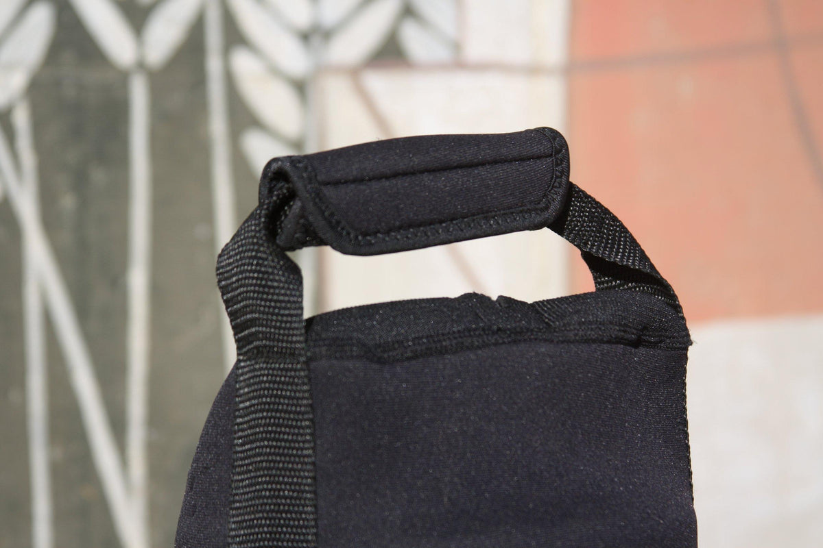 Close-up of the black neoprene Tank Top's fabric and seam texture