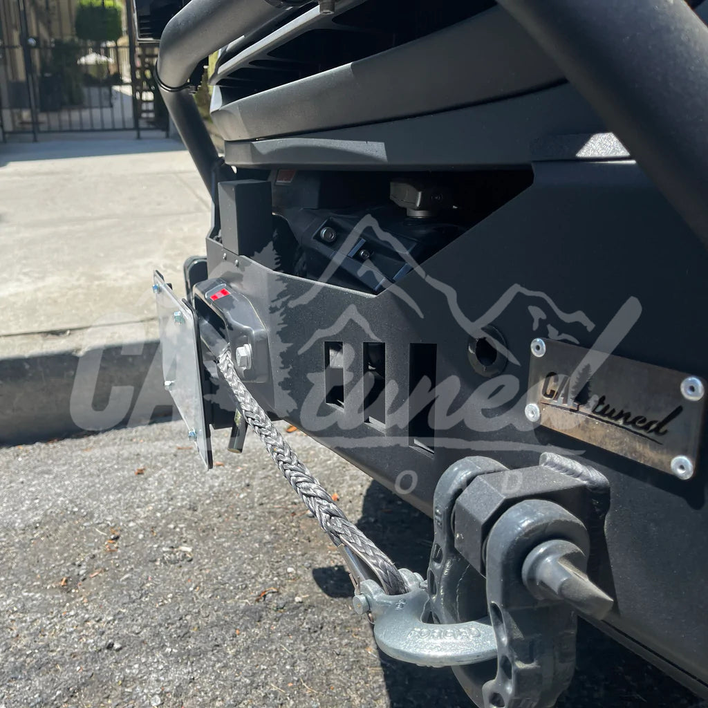 Relocation bracket and a shackle visible below a black bumper
