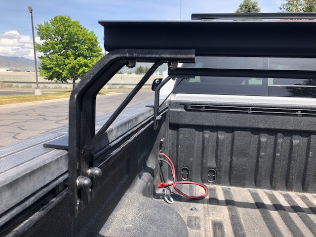 Close-up of K9 bed rail mount leg inside a truck bed