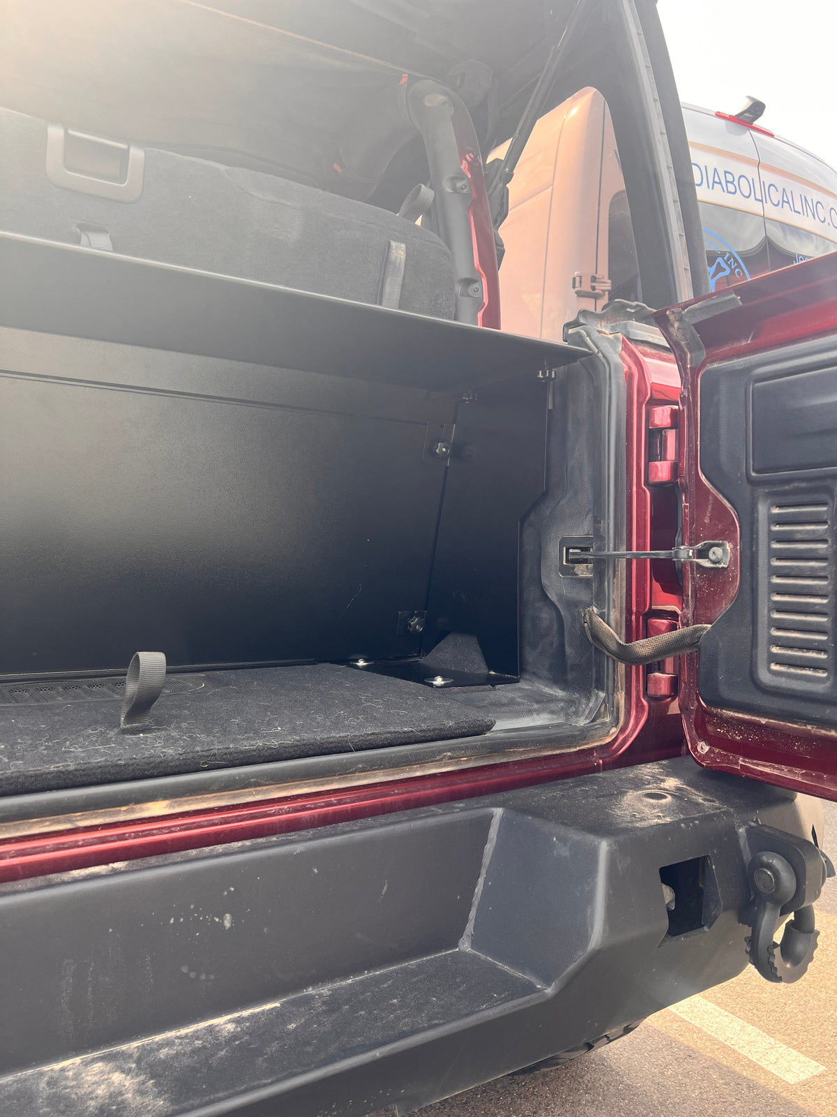 Close view into the JL Locker compartment from the tailgate