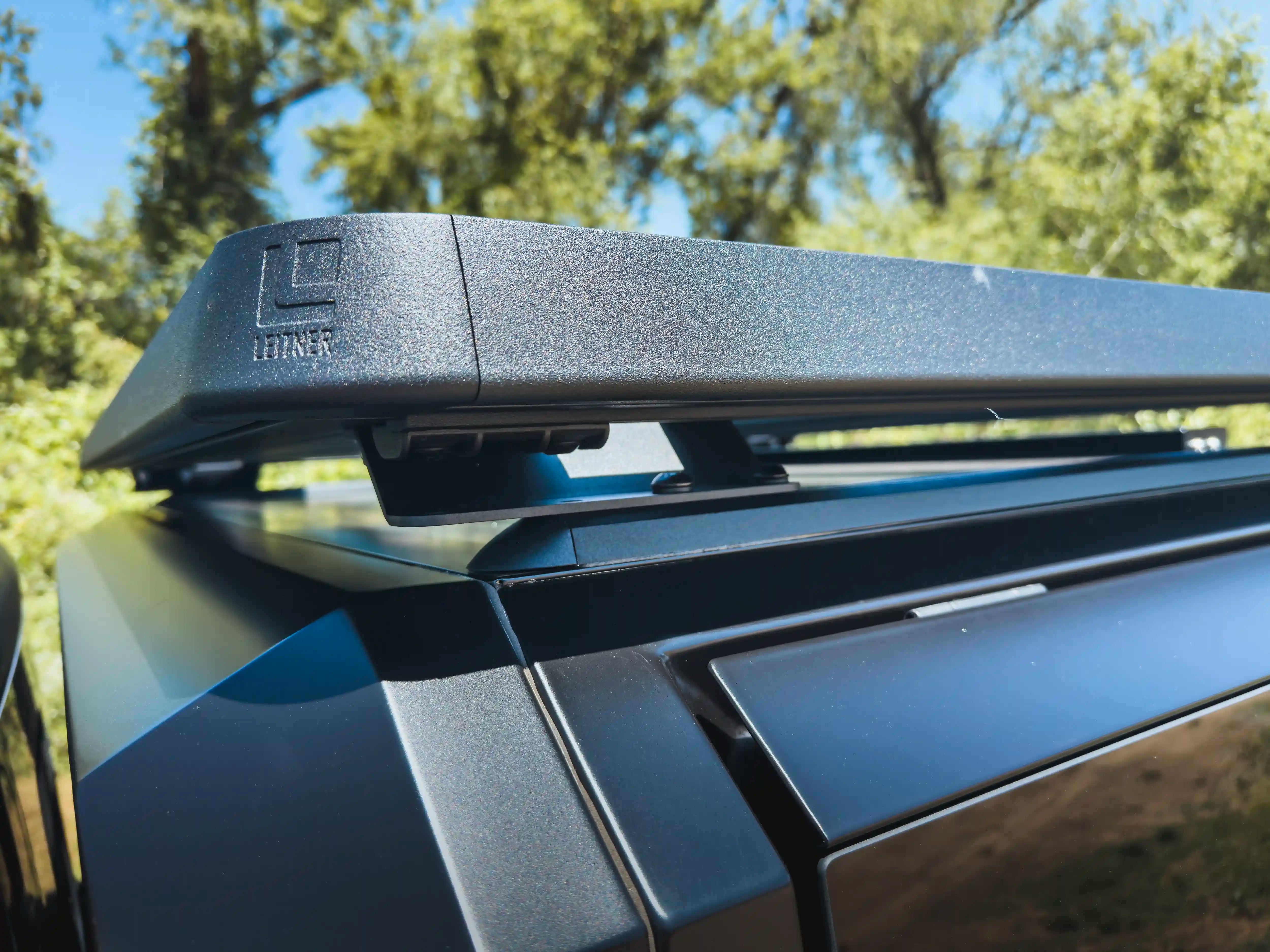 Truck with ACS Roof Platform on SmartCap navigating rugged terrain, emphasizing durability and off-road readiness.