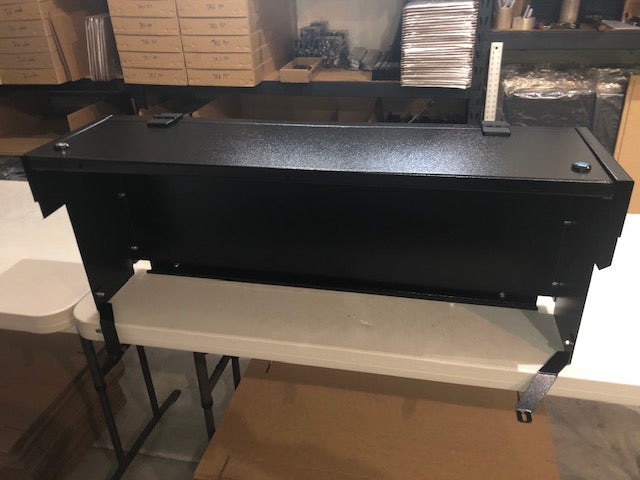Diabolical Locker unit on a workbench, front view
