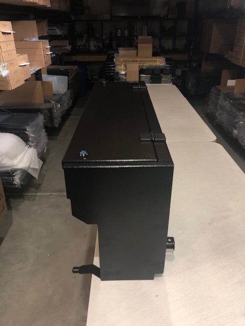 Locker unit on a table, end view showing the mounting feet