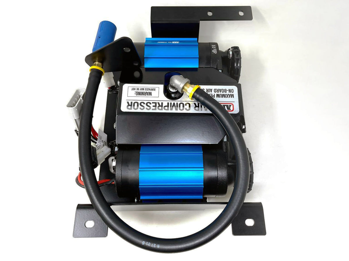 Twin air compressor on its mount seen from the front