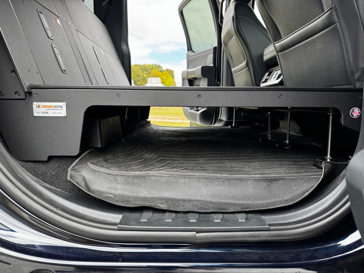 CargoKits Rear Seat Delete in a Ford F-Series SuperCrew, real install photo showing panel seams and hardware