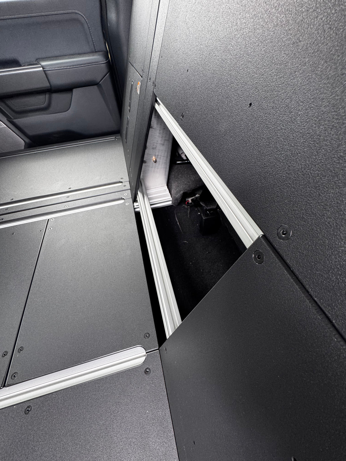 CargoKits Rear Seat Delete in a Ford F-Series SuperCrew, close-up of the platform's CargoKits identification plate