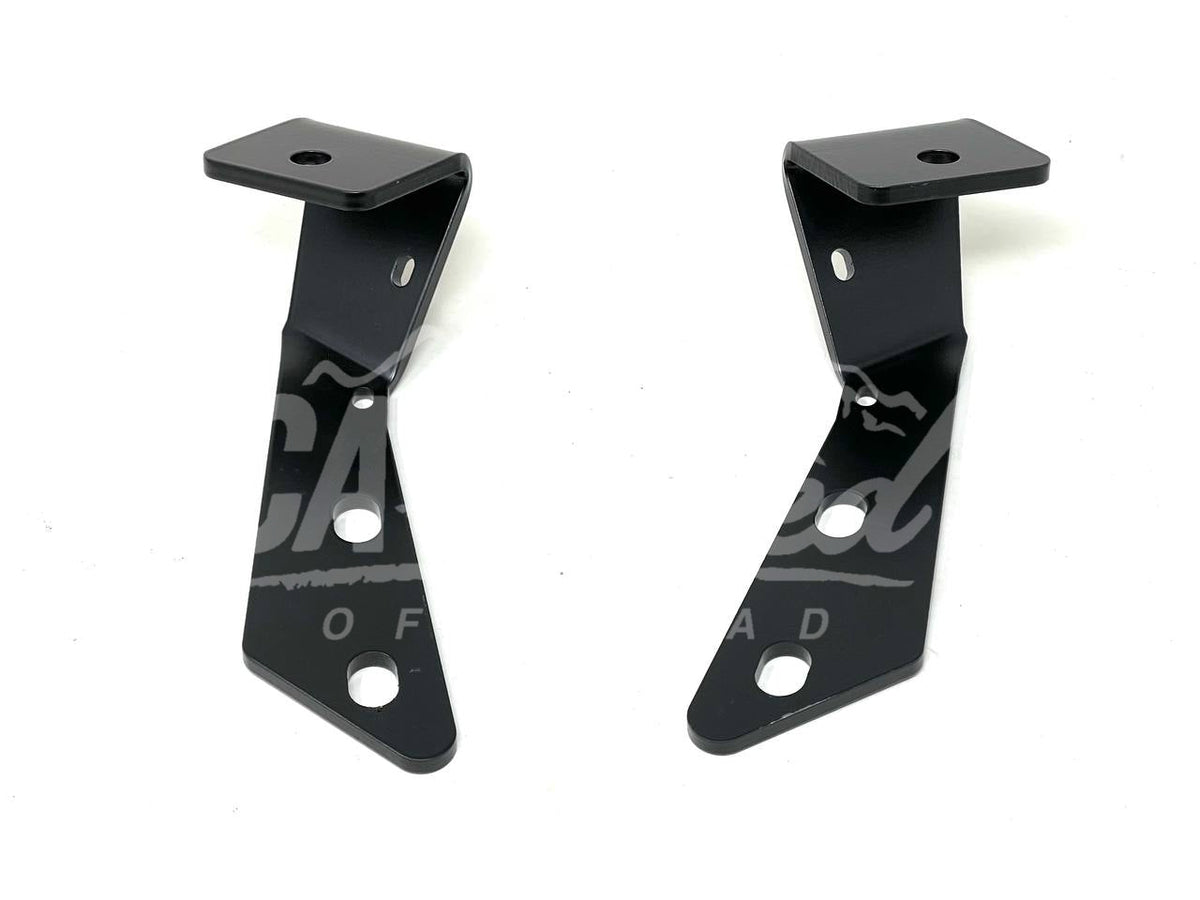 Pair of black ditch light brackets on a white background