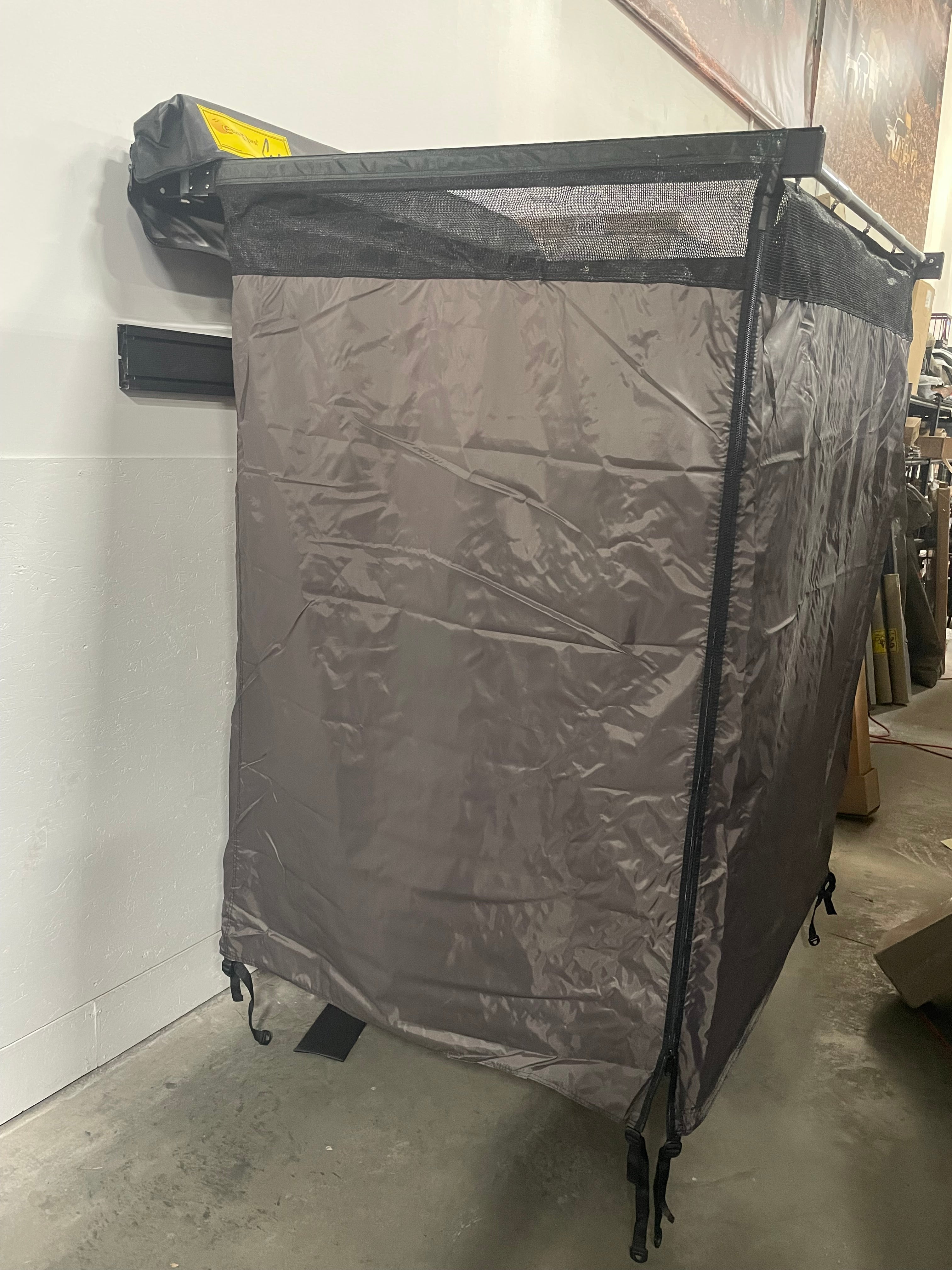 Eezi-Awn K9 Cube compact packed profile on the rack