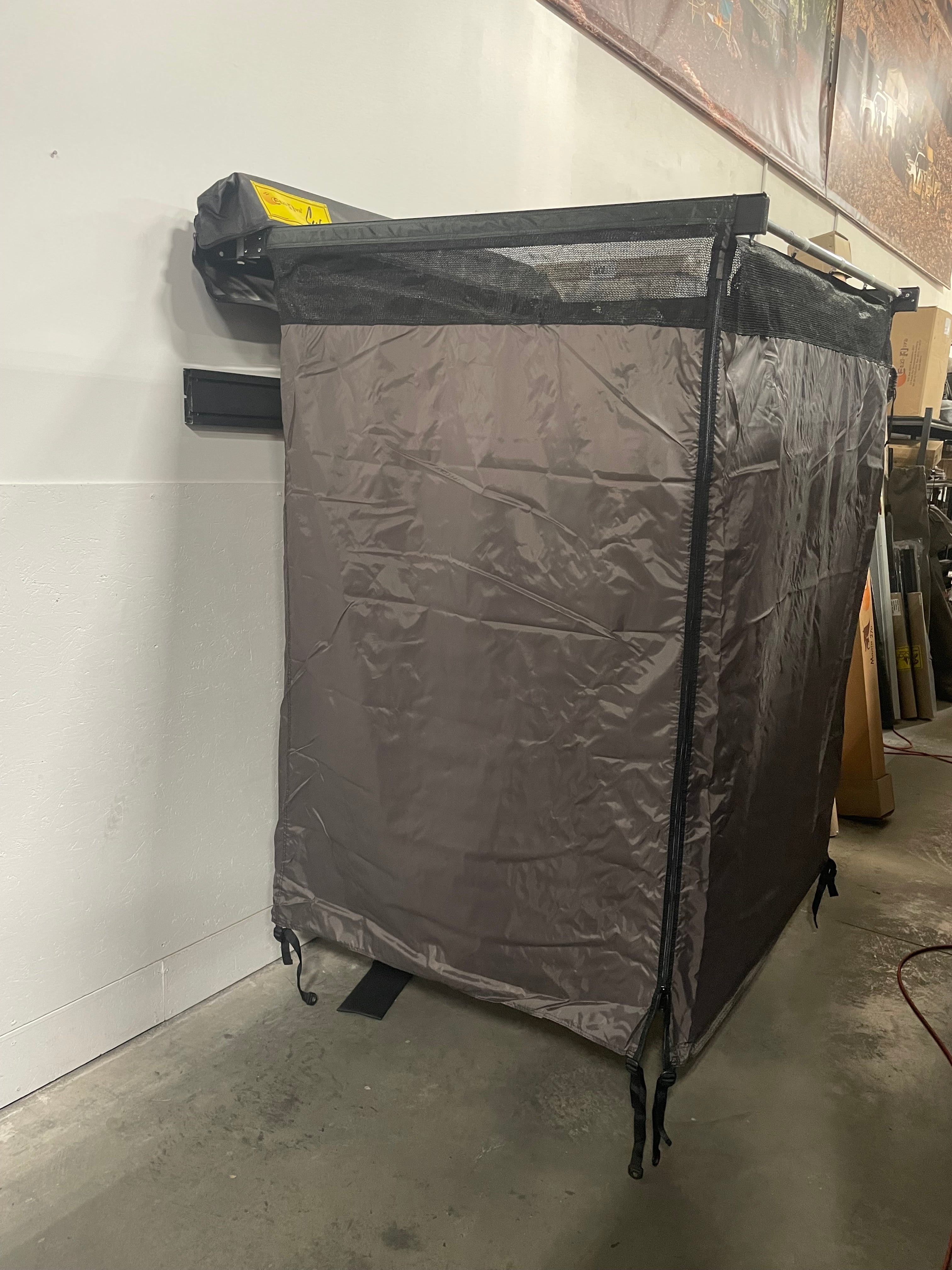 Eezi-Awn K9 Cube side profile mounted on a roof rack